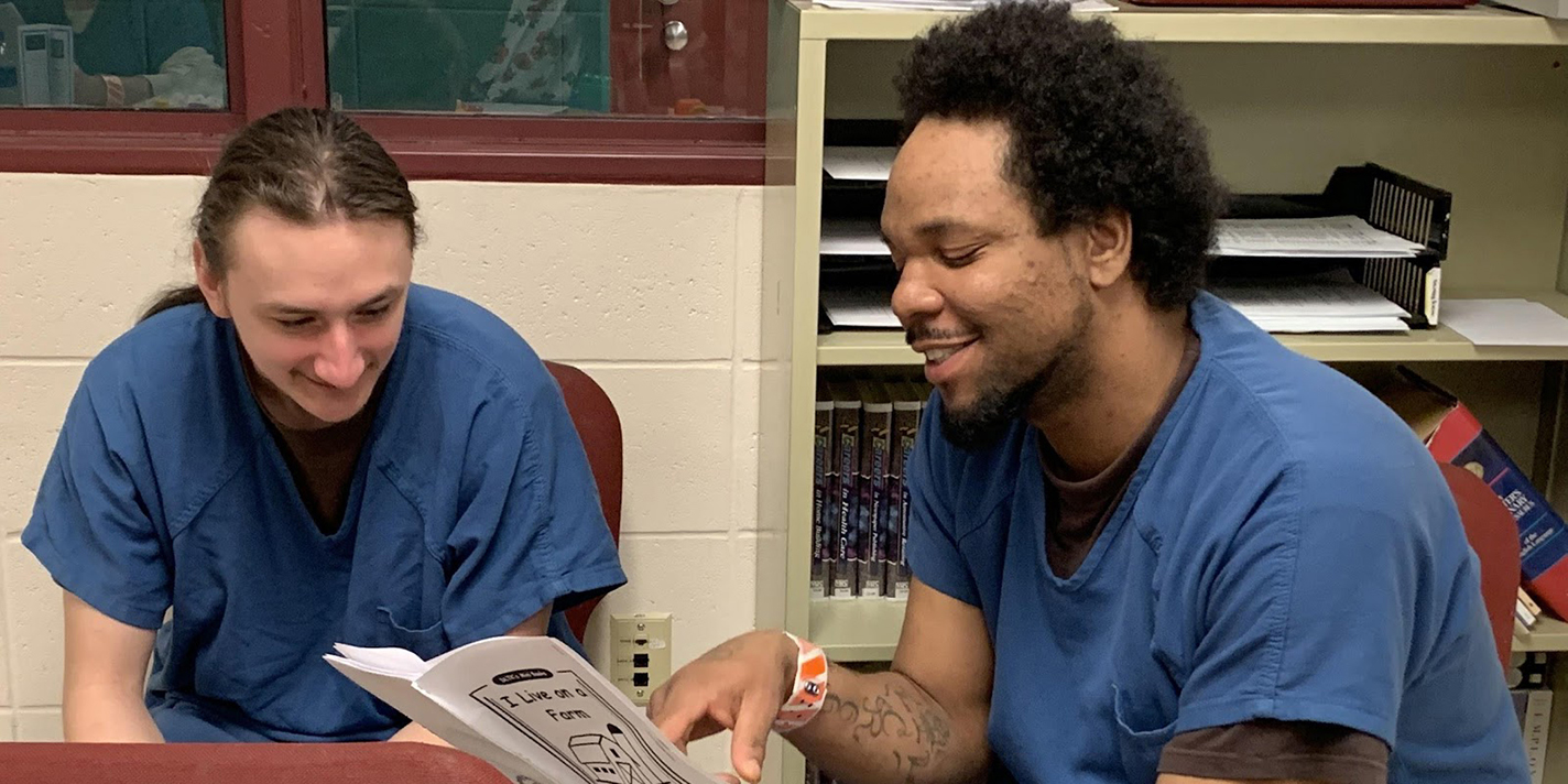 People reading a book