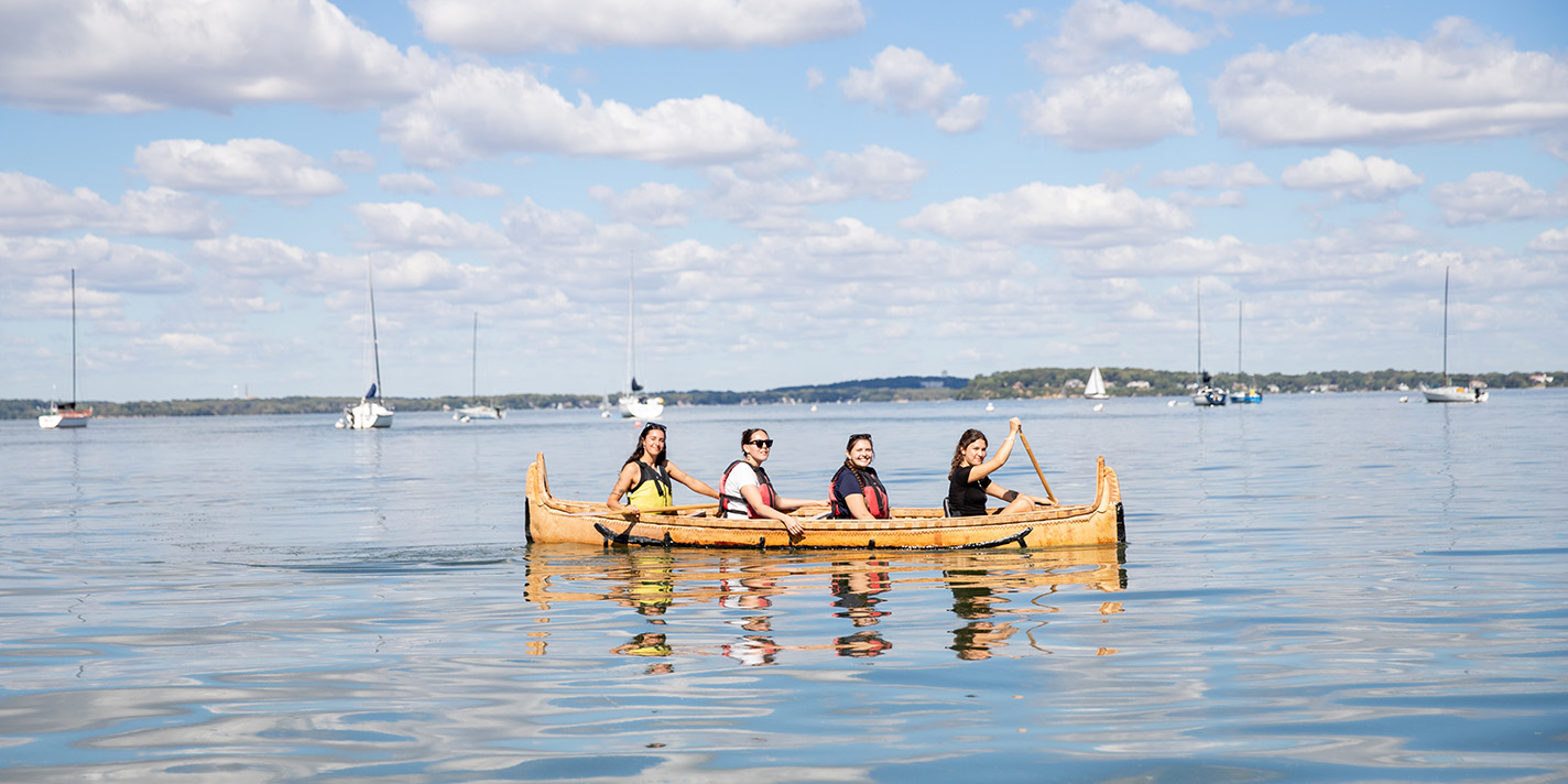 Students on a canoe