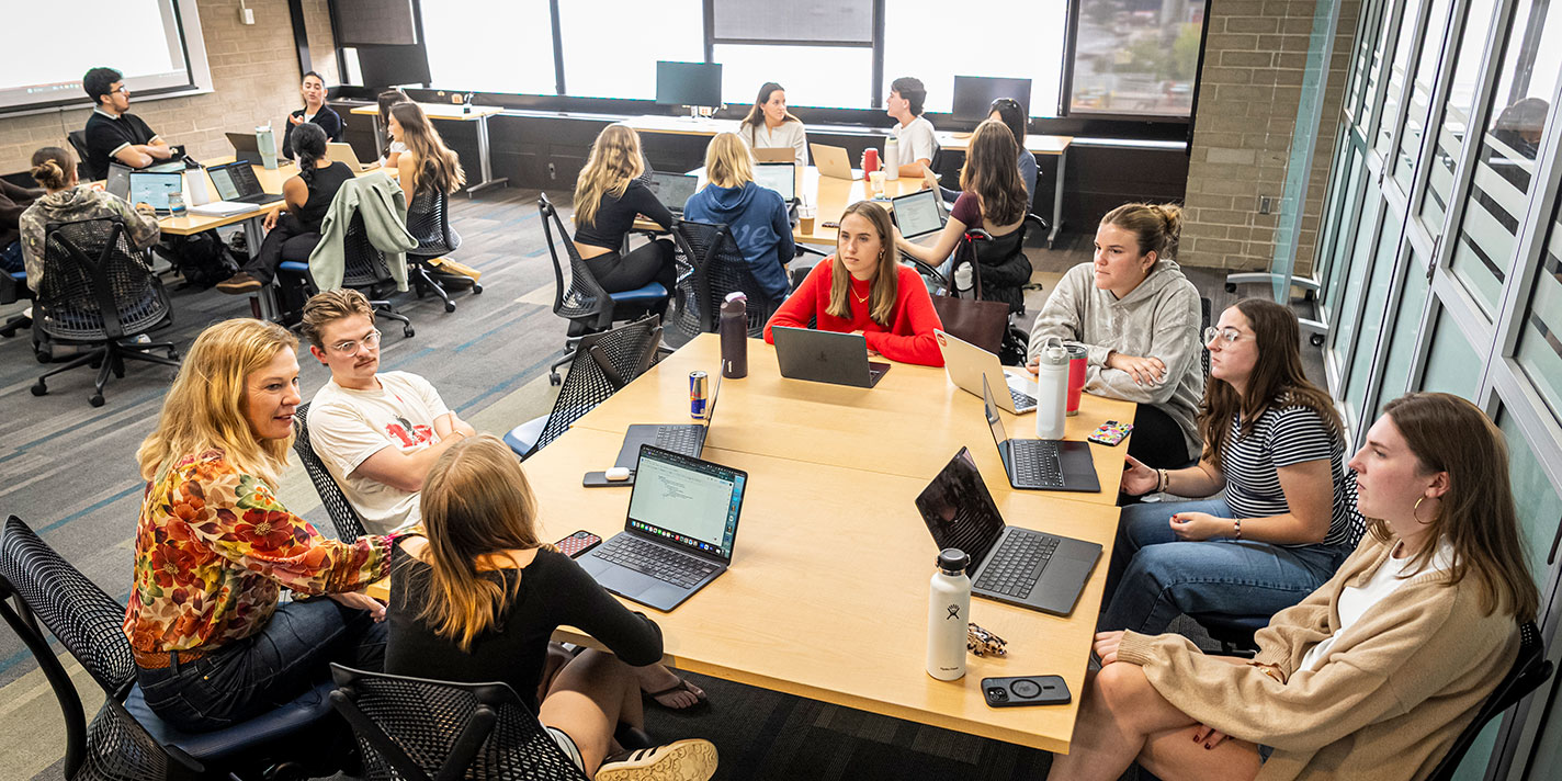 Students engaged in discussion during a class